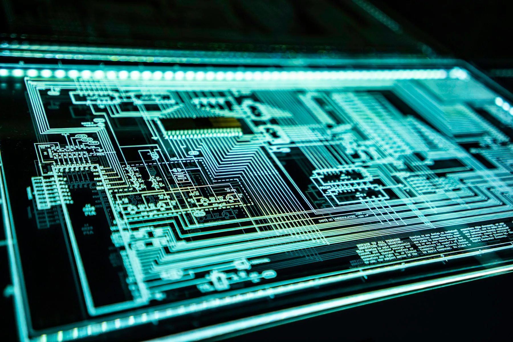 Glowing circuit board under blue light
